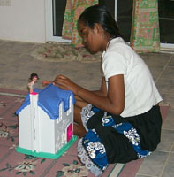 Hannah with Shred's house.