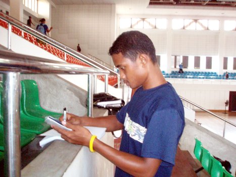 A UB working intently on mathematics