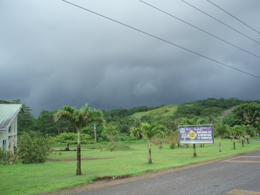 rain front approaches heralded by dark clouds