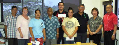 Text Box:    Three of the STAP Scholarship recipients with COM-FSM and STAP officials    