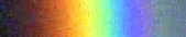 A magnification of a rainbow image taken with a digital camera to show the spectral nature of a rainbow