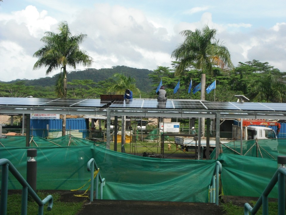 Picture of the solar panel arrays going up at the college