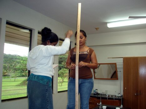 Vishani drops the ball, Renee holds the meter sticks.