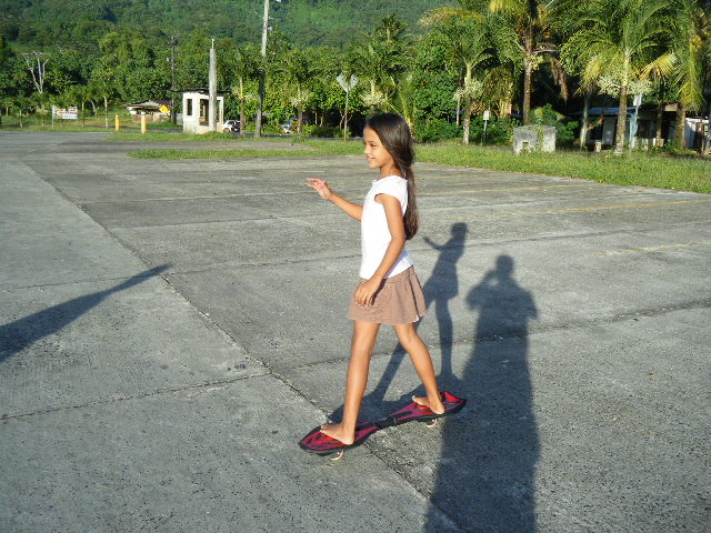 Young girl riding a RipStik