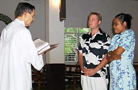 David Brian Lynch and Clara Henry listen to wedding vows