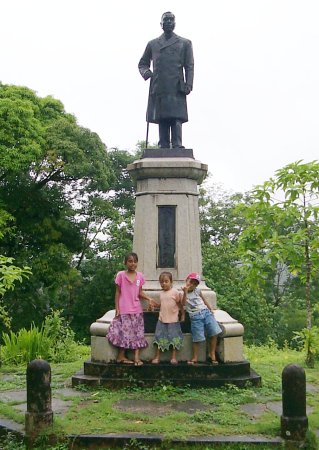 The kids at the Henry Nanpei statute.