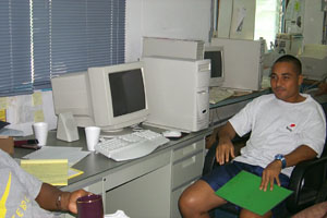 Dominic with Title III DVD computer on Bob's desk